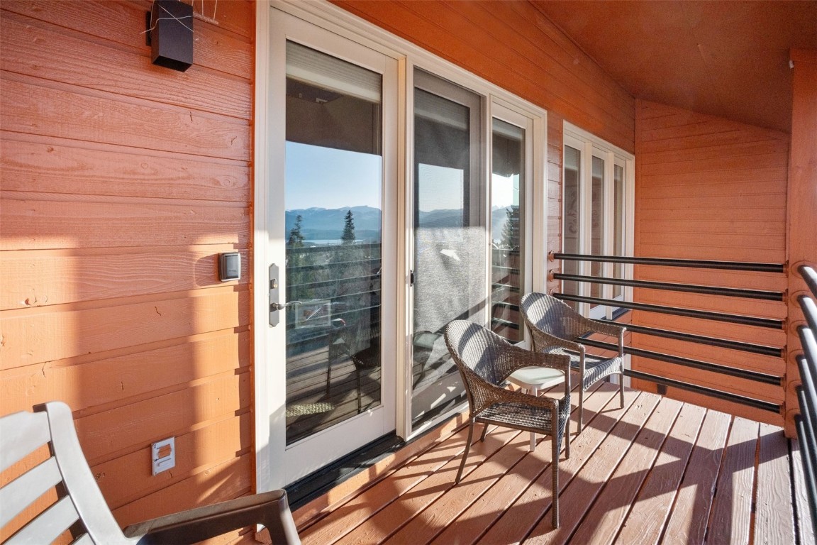 91400 Ryan Gulch Road, Unit 91425 Silverthorne, CO 80498 - Photo 5 of 42 a view of balcony with wooden floor