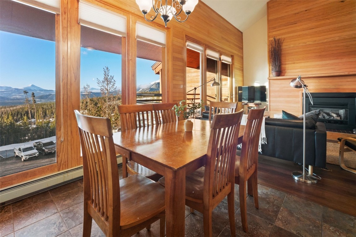 91400 Ryan Gulch Road, Unit 91425 Silverthorne, CO 80498 - Photo 9 of 42 a view of a dining room with furniture window and outside view