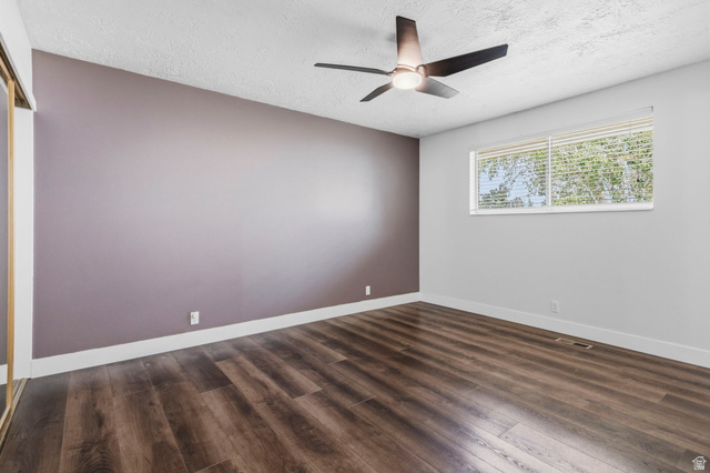 2693 Teal Way Sandy, UT 84093 - Photo 16 of 50 Bedroom featuring wood-finish flooring, a contemporary ceiling fan, and a wide window with blinds
