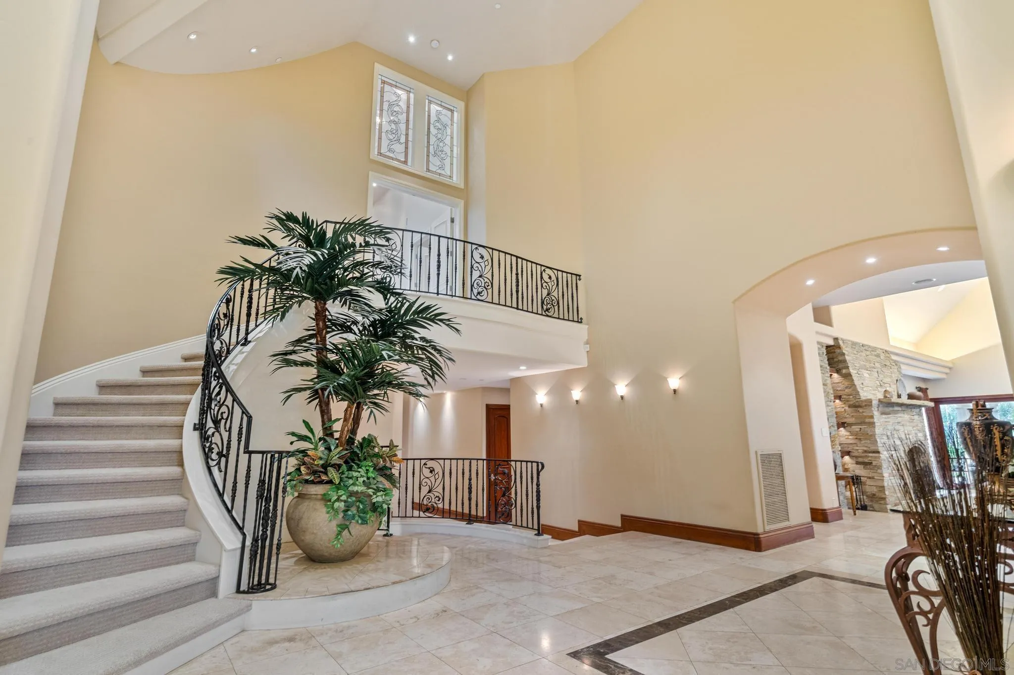 14380 Ciera Court Poway, CA 92064 - Photo 19 of 51 a potted plant sitting in front of a house