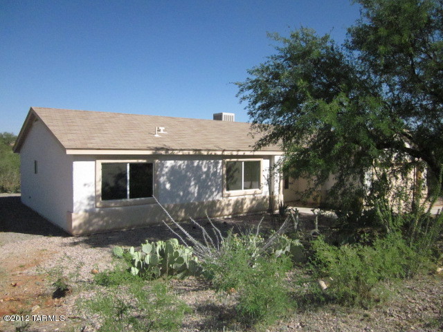 70 Círculo Cortez Rio Rico, AZ 85648 - Photo 6 of 13 a view of a house with a yard and tree s