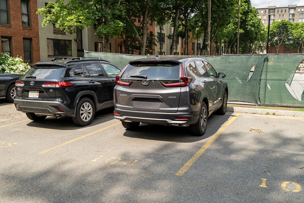 32 Juniper Street, Unit 91 Brookline, MA 02445 - Photo 16 of 21 a view of a car in garage