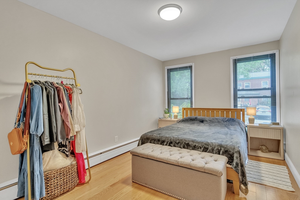 32 Juniper Street, Unit 91 Brookline, MA 02445 - Photo 10 of 21 a bedroom with a bed and a window