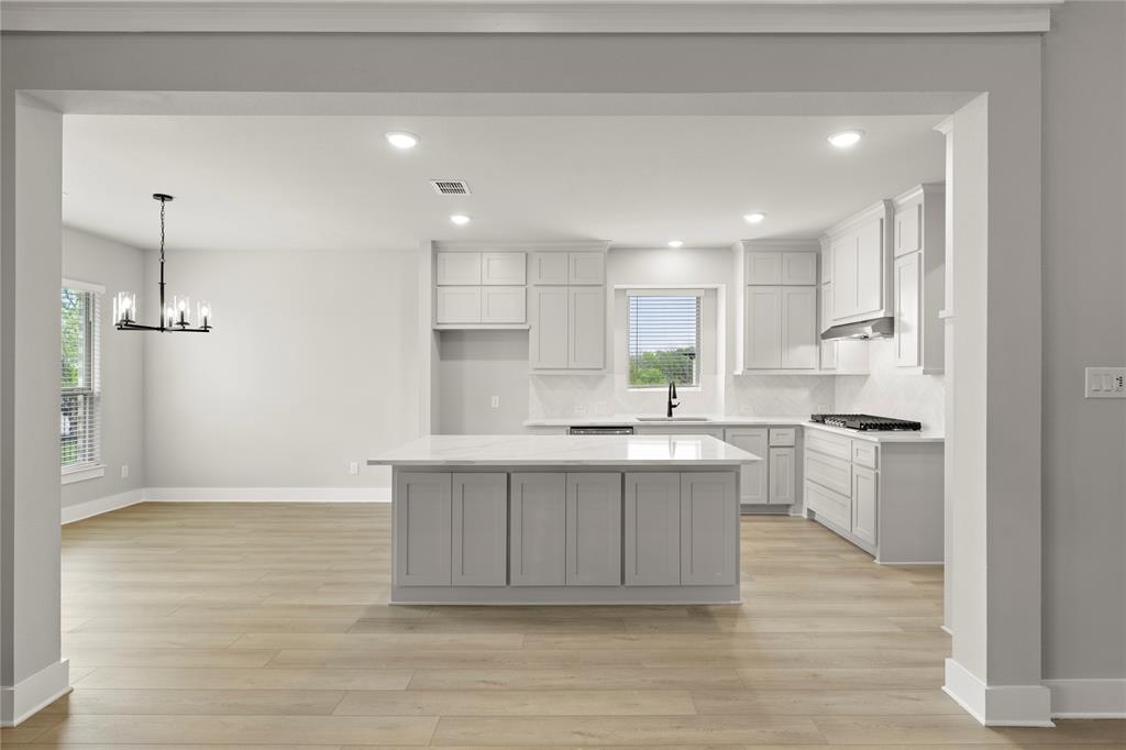 932 Pilatus Lane Fate, TX 75087 - Photo 9 of 26 10. 932 Pilatus - Kitchen