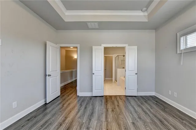 a view of a hallway with stairs