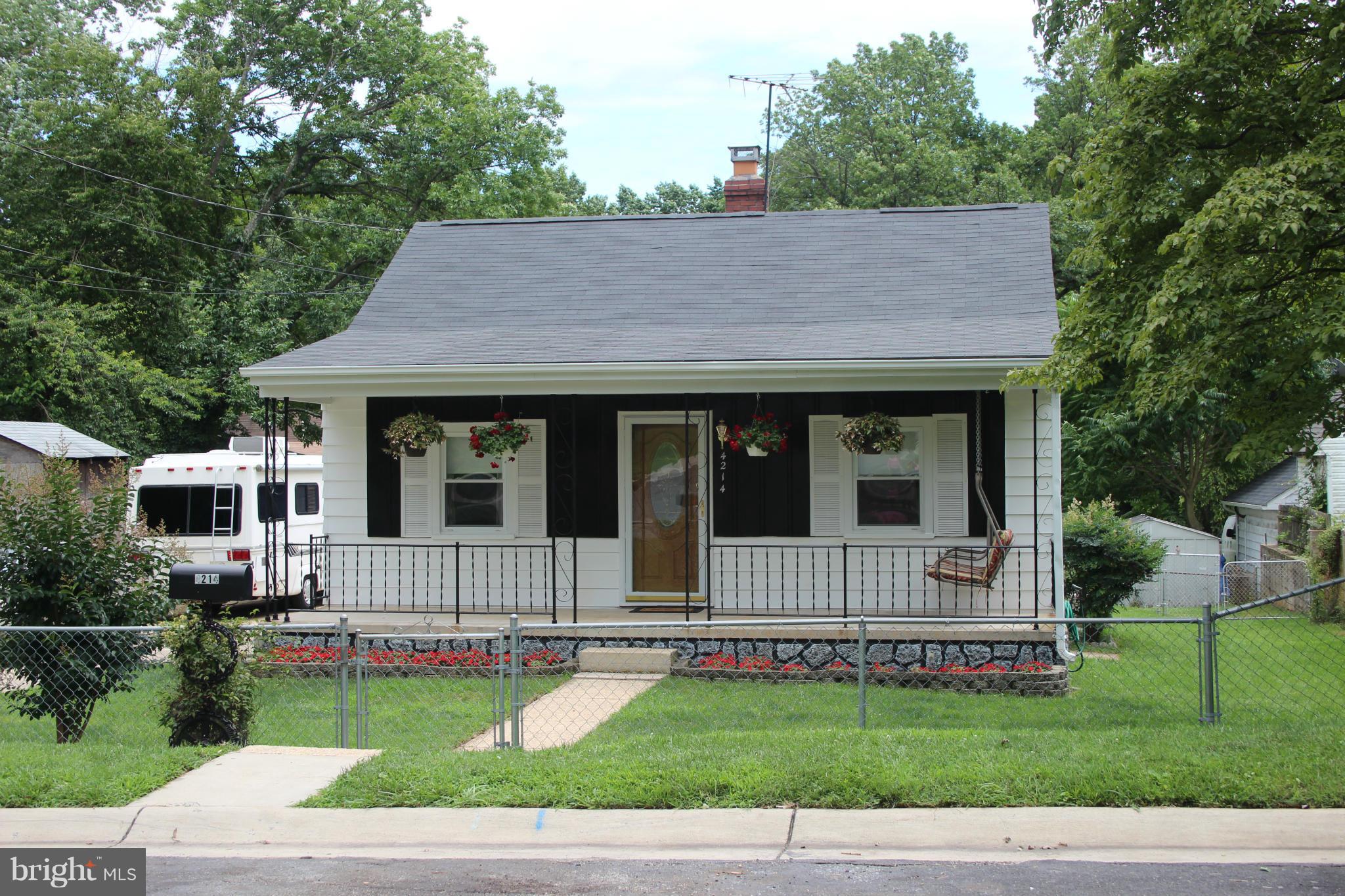 4214 Garrett Park Road Silver Spring, MD 20906 - Photo 1 of 22 a house view with a garden space