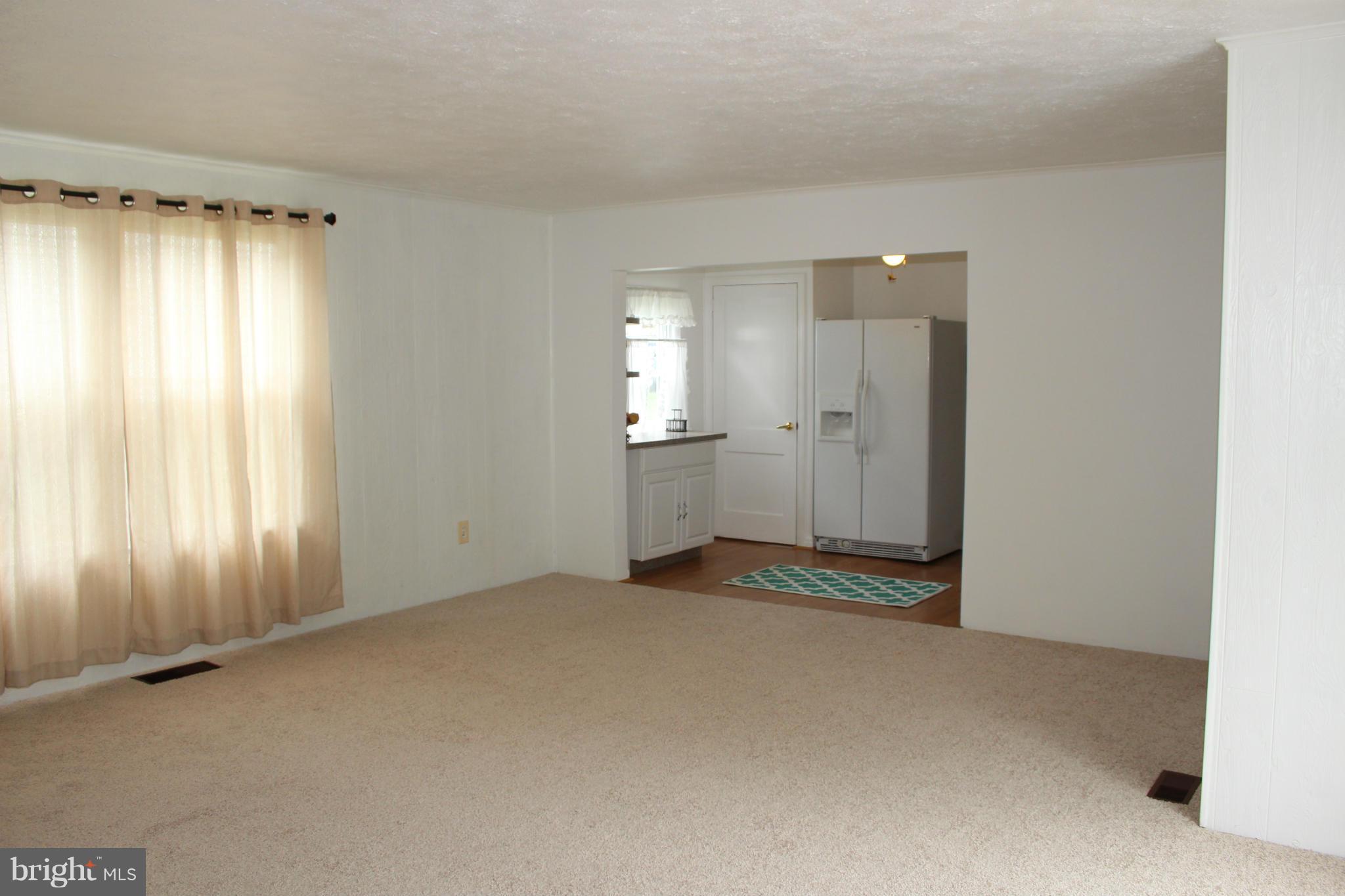 4214 Garrett Park Road Silver Spring, MD 20906 - Photo 15 of 22 a view of an empty room with a window