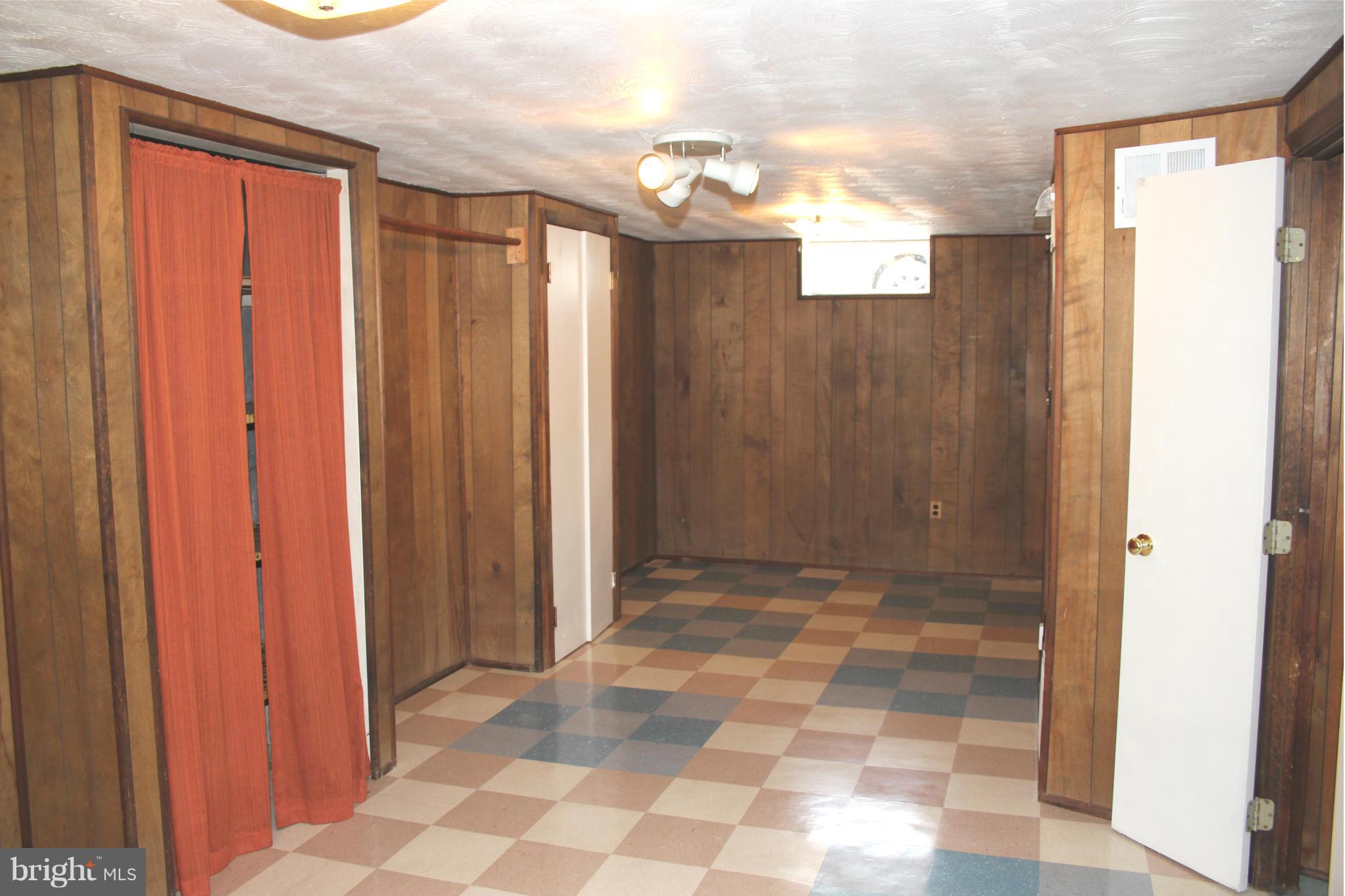 4214 Garrett Park Road Silver Spring, MD 20906 - Photo 16 of 22 a view of a hallway with windows