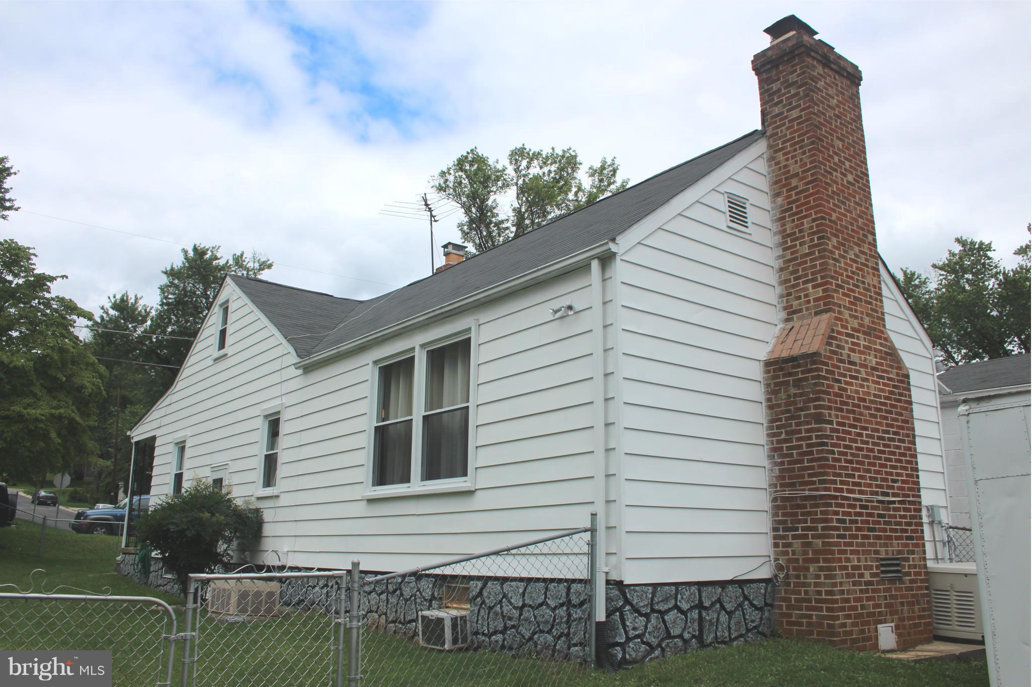 4214 Garrett Park Road Silver Spring, MD 20906 - Photo 22 of 22 a view of a house with a yard
