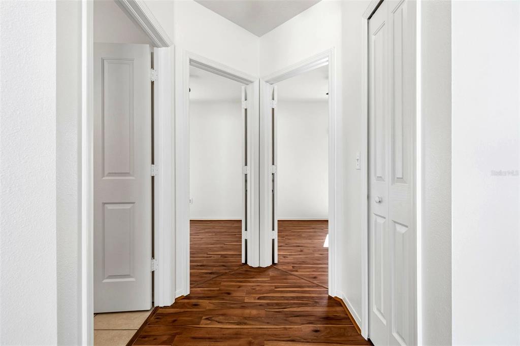 5311 Watson Road Riverview, FL 33578 - Photo 20 of 33 a view of a hallway with wooden floor and entryway