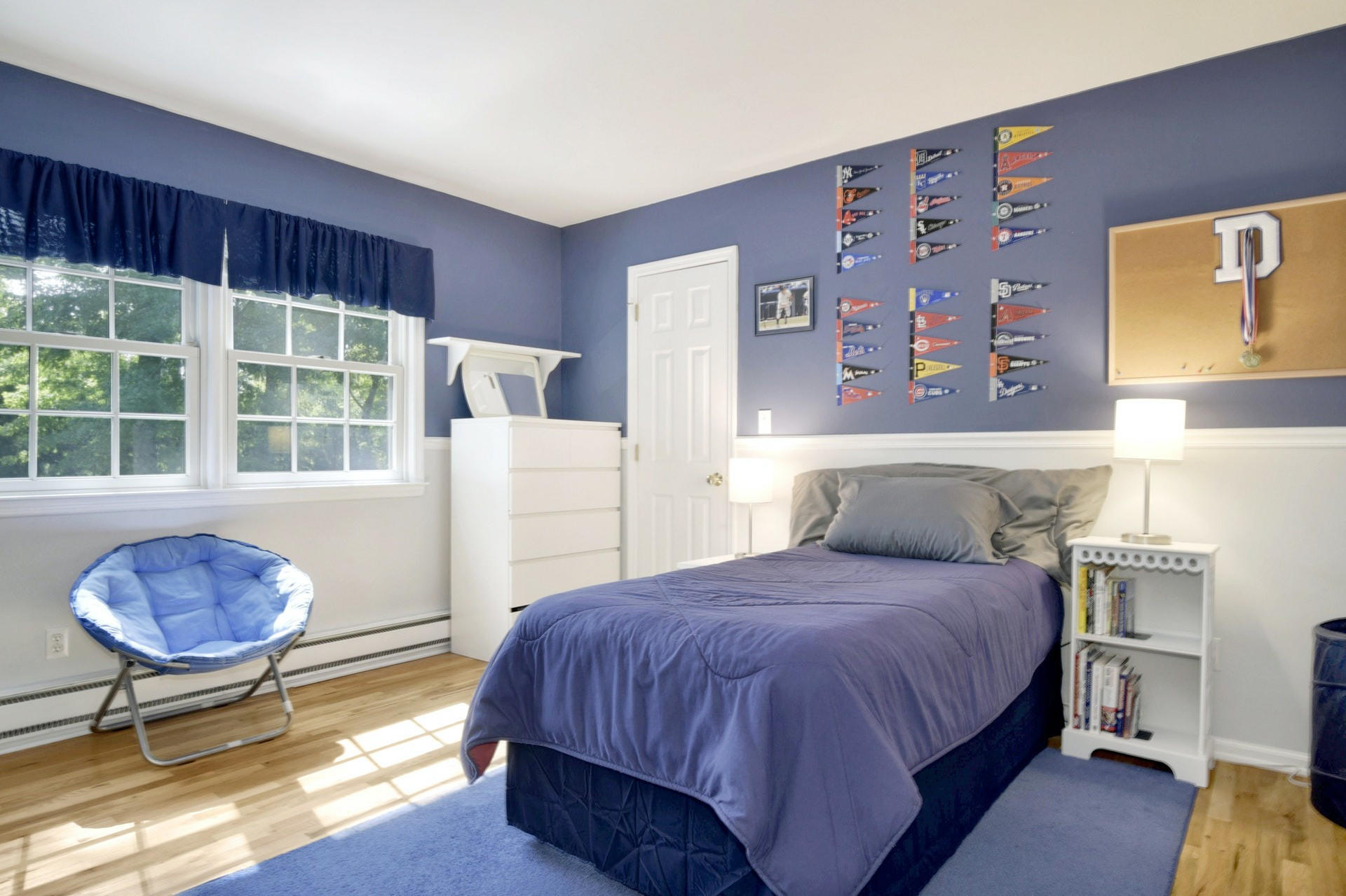 1 Country Club Road Darien, CT 06820 - Photo 15 of 25 a bedroom with a bed dresser and a window