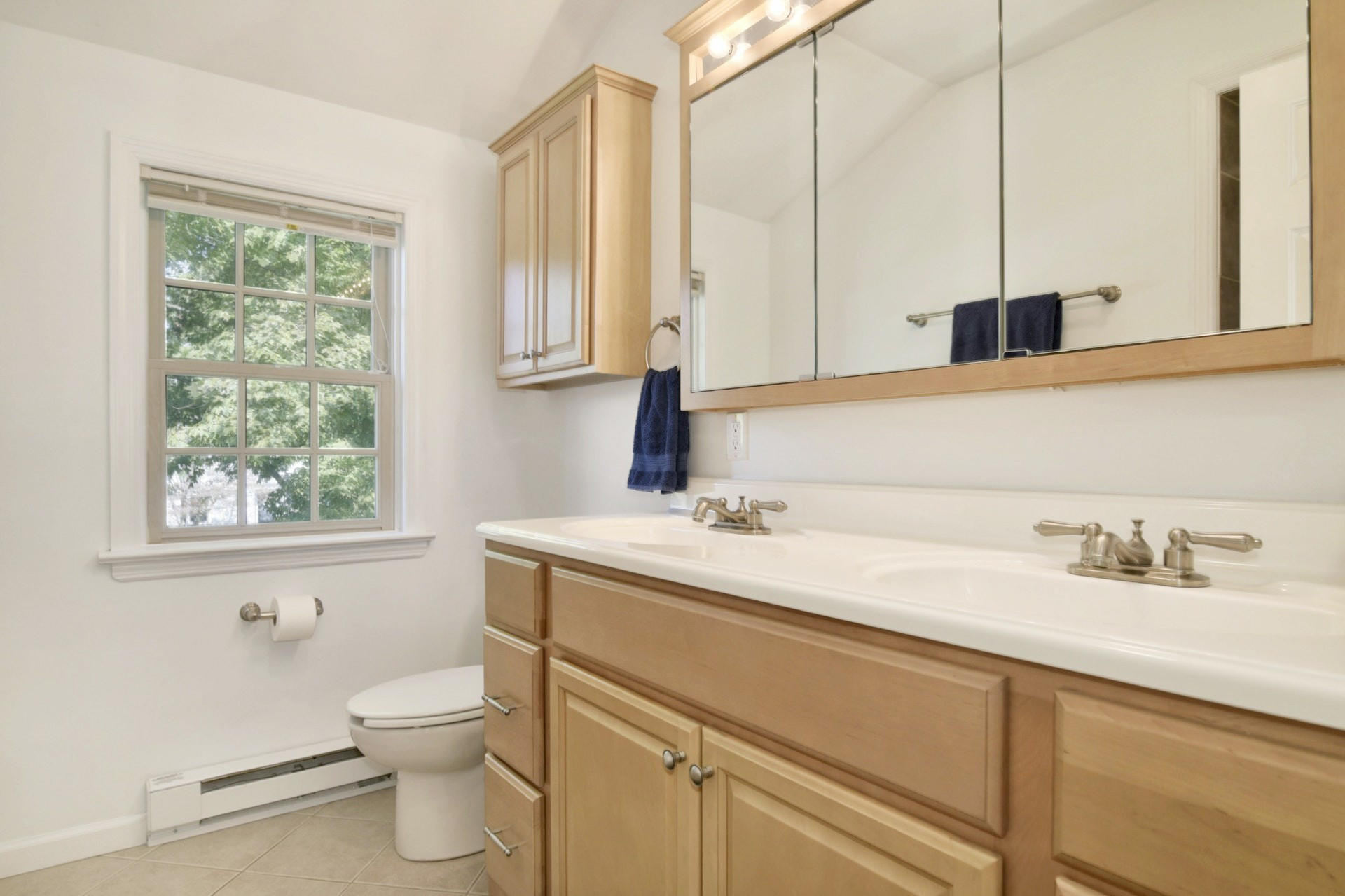 1 Country Club Road Darien, CT 06820 - Photo 17 of 25 a bathroom with a granite countertop sink and a toilet