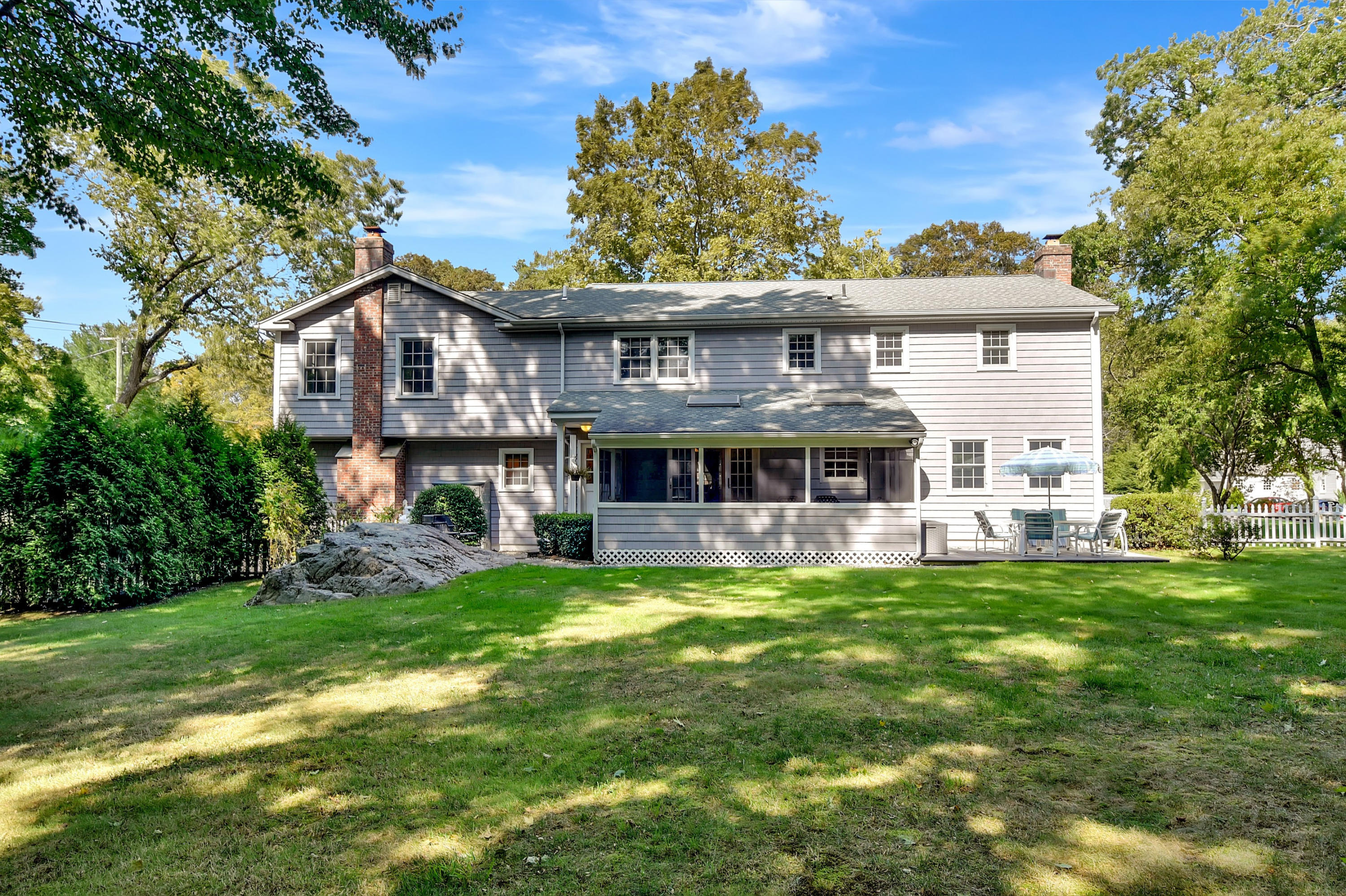 1 Country Club Road Darien, CT 06820 - Photo 24 of 25 a view of a house with a big yard and large trees