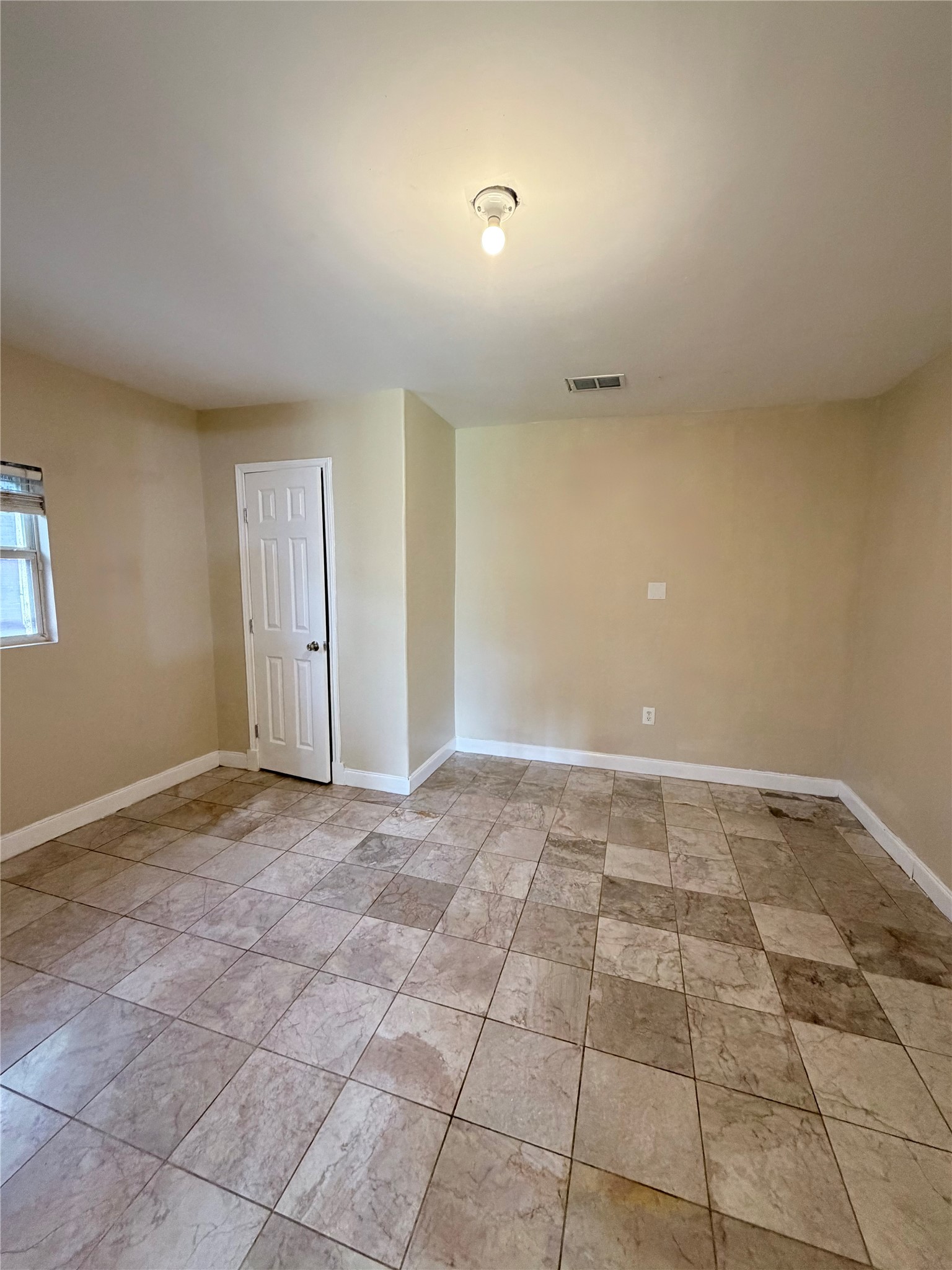 618 Sulphur Street Houston, TX 77034 - Photo 17 of 25 a view of an empty room and window