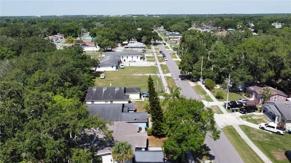 an aerial view of a house with lake view