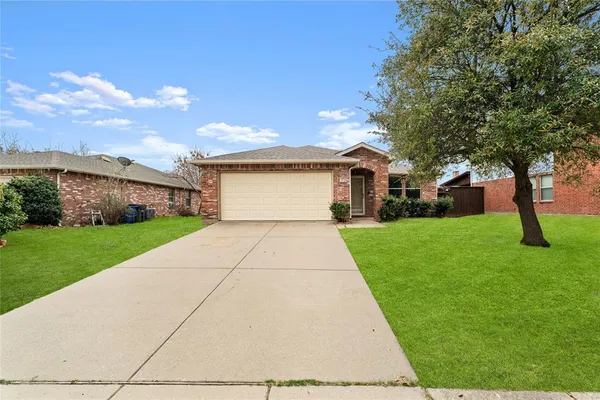 a front view of house with yard