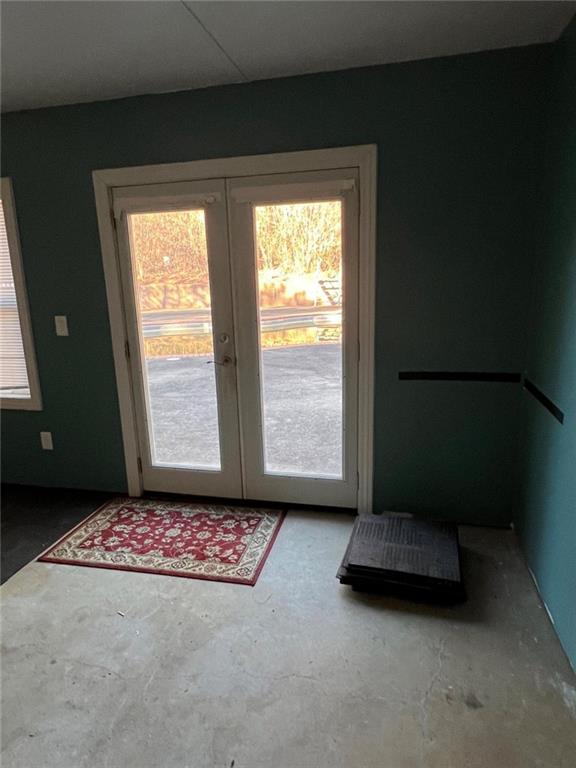 1401 Stone Bridge Lane Conyers, GA 30094 - Photo 16 of 27 a living room with furniture and a rug