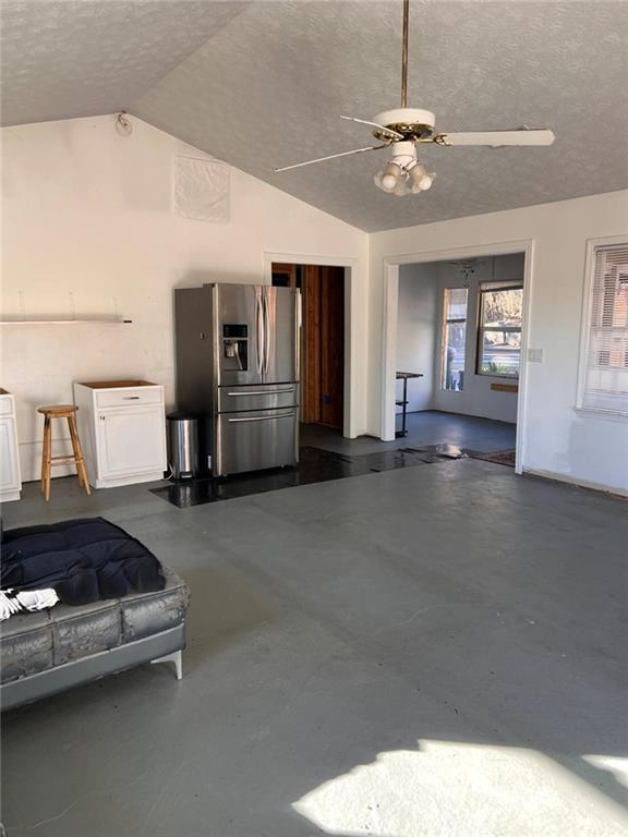 1401 Stone Bridge Lane Conyers, GA 30094 - Photo 4 of 27 a living room with furniture and chandelier