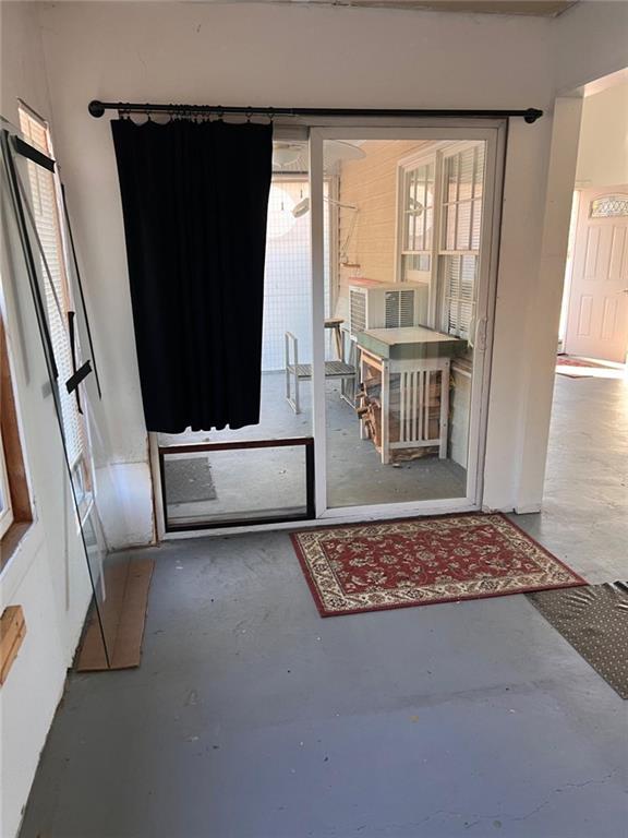 1401 Stone Bridge Lane Conyers, GA 30094 - Photo 9 of 27 a living room with a couch and a table