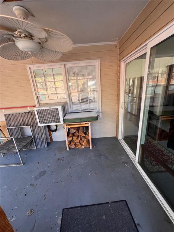 1401 Stone Bridge Lane Conyers, GA 30094 - Photo 10 of 27 a living room with furniture and a floor to ceiling window