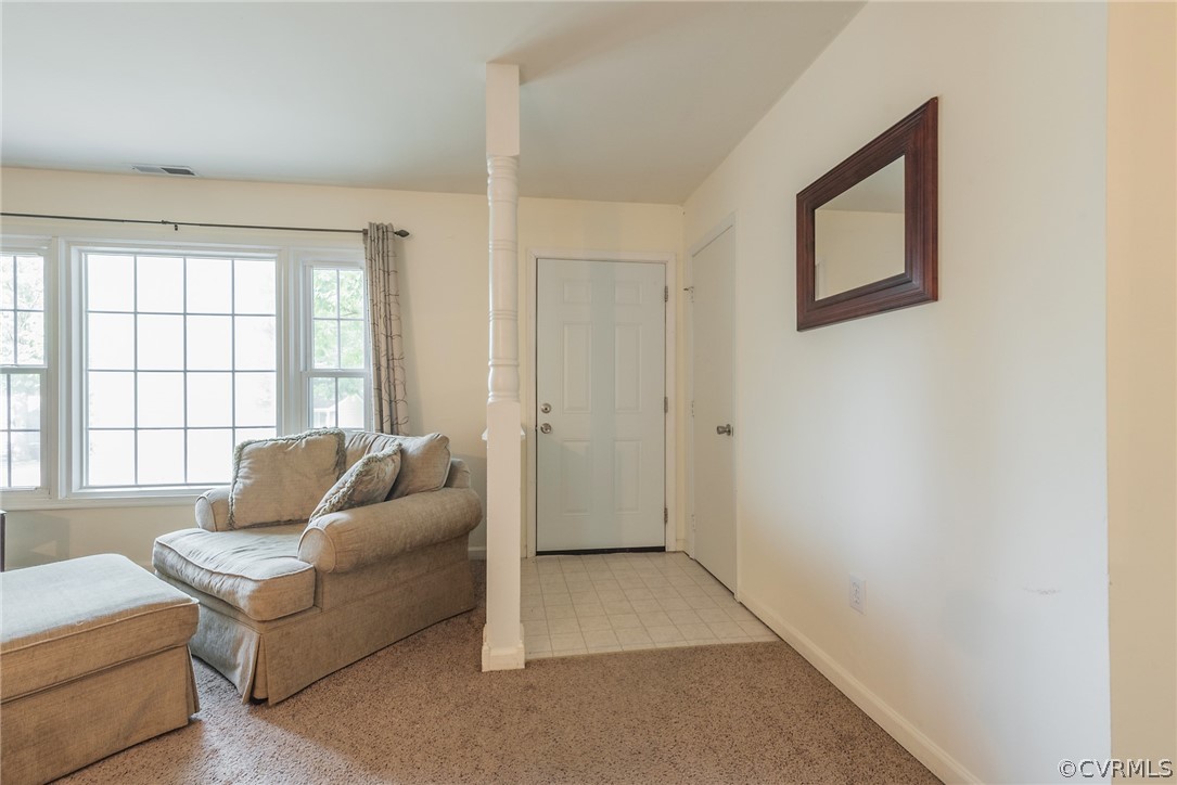 2937 Shiloh Church Road Midlothian, VA 23112 - Photo 4 of 24 a living room with furniture and a window