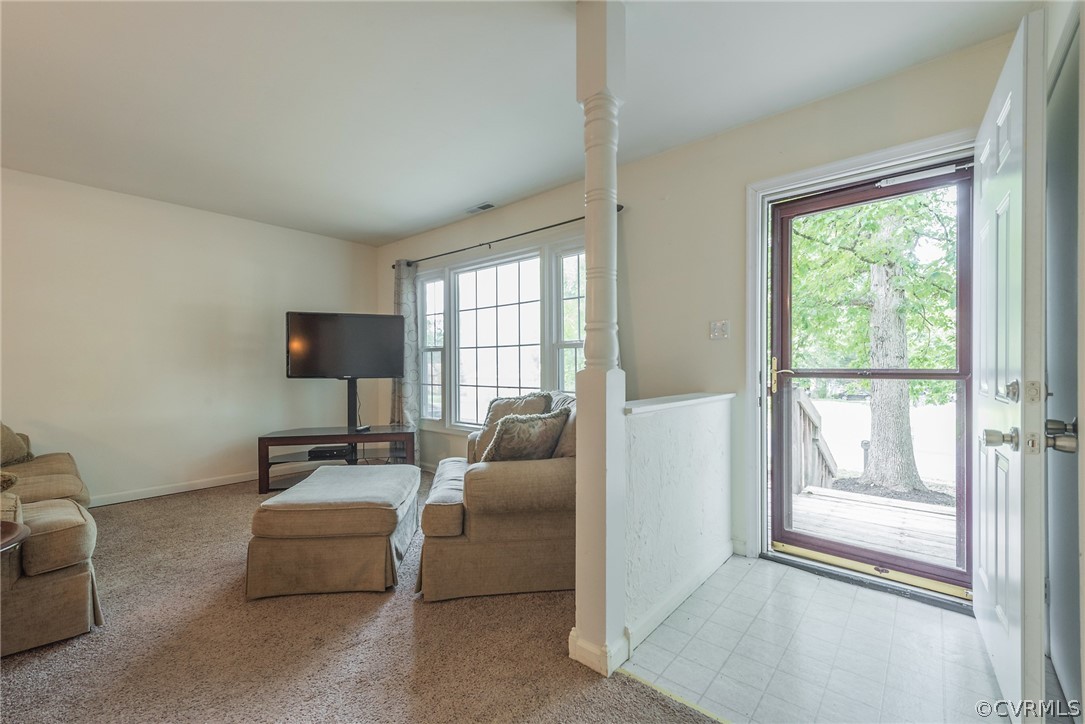 2937 Shiloh Church Road Midlothian, VA 23112 - Photo 5 of 24 a living room with furniture and a flat screen tv