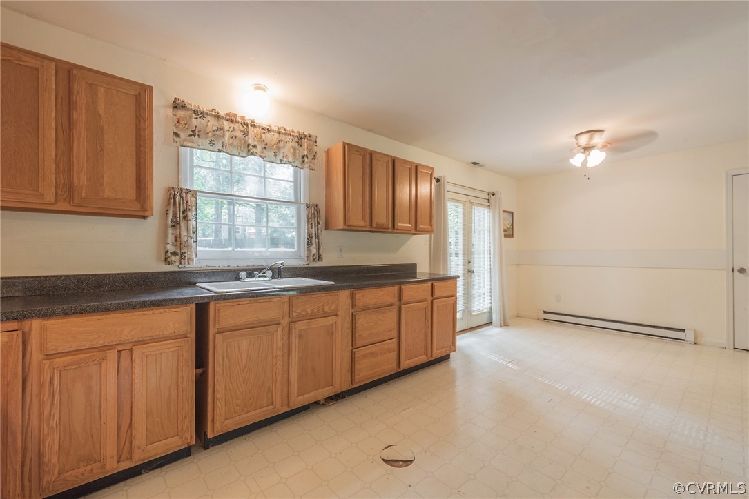 2937 Shiloh Church Road Midlothian, VA 23112 - Photo 10 of 24 a kitchen with granite countertop a sink cabinets and stainless steel appliances