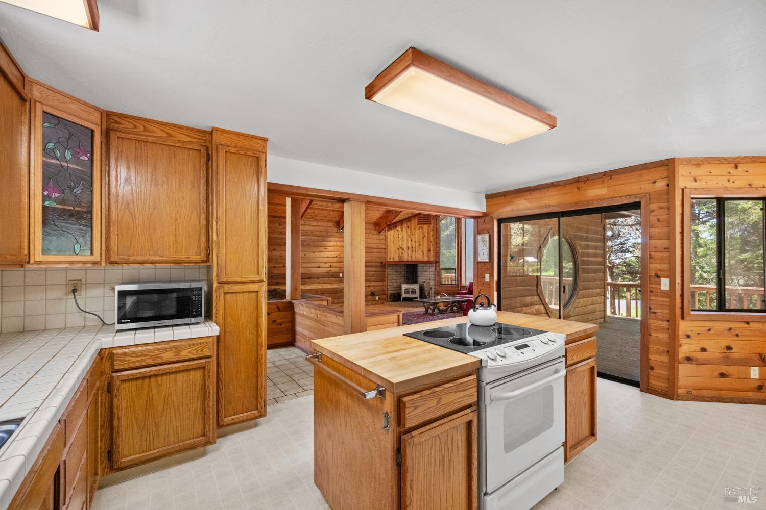 46320 Iversen Road Gualala, CA 95445 - Photo 14 of 46 a kitchen that has a sink and a stove