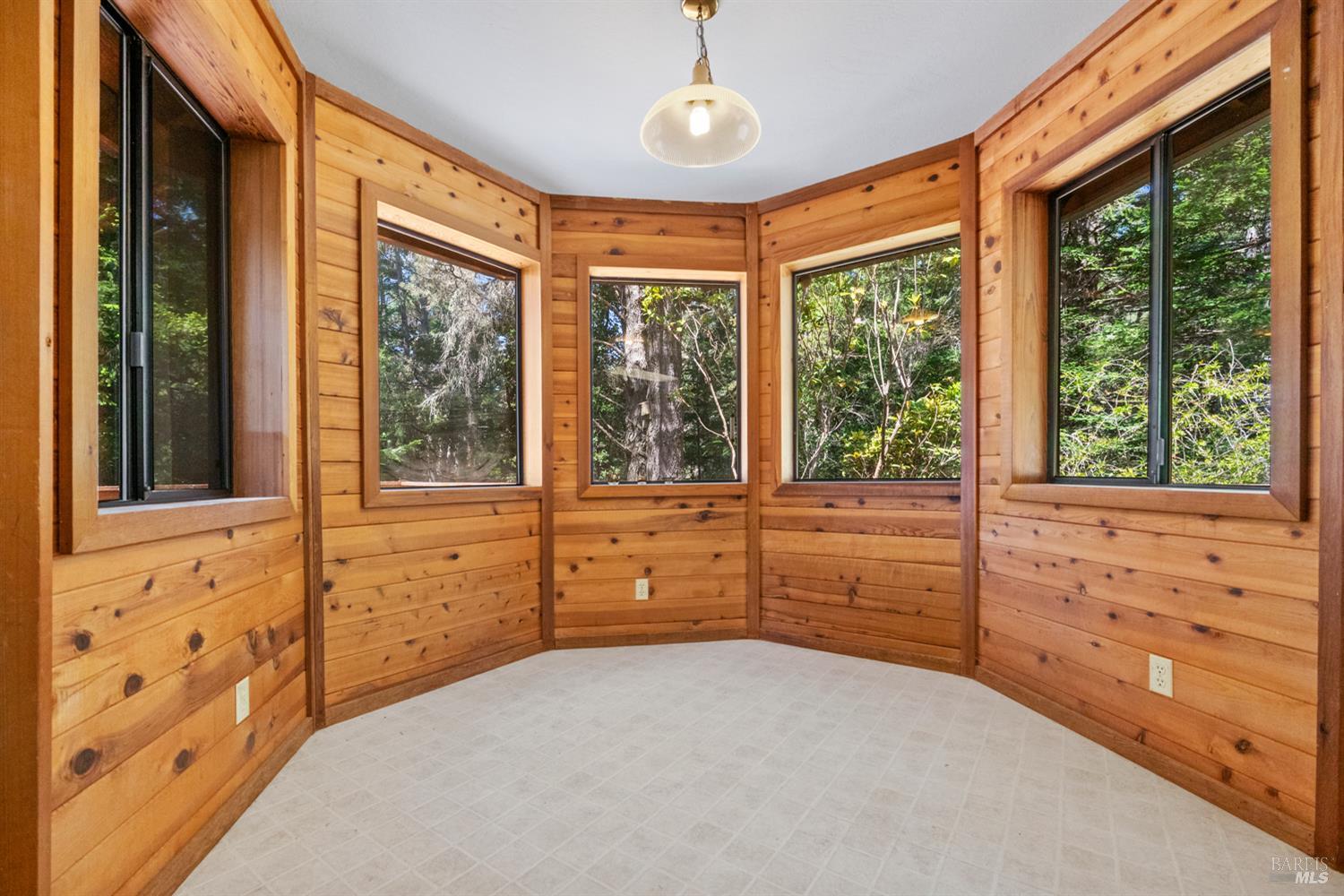 46320 Iversen Road Gualala, CA 95445 - Photo 15 of 46 a room with window with bed and windows