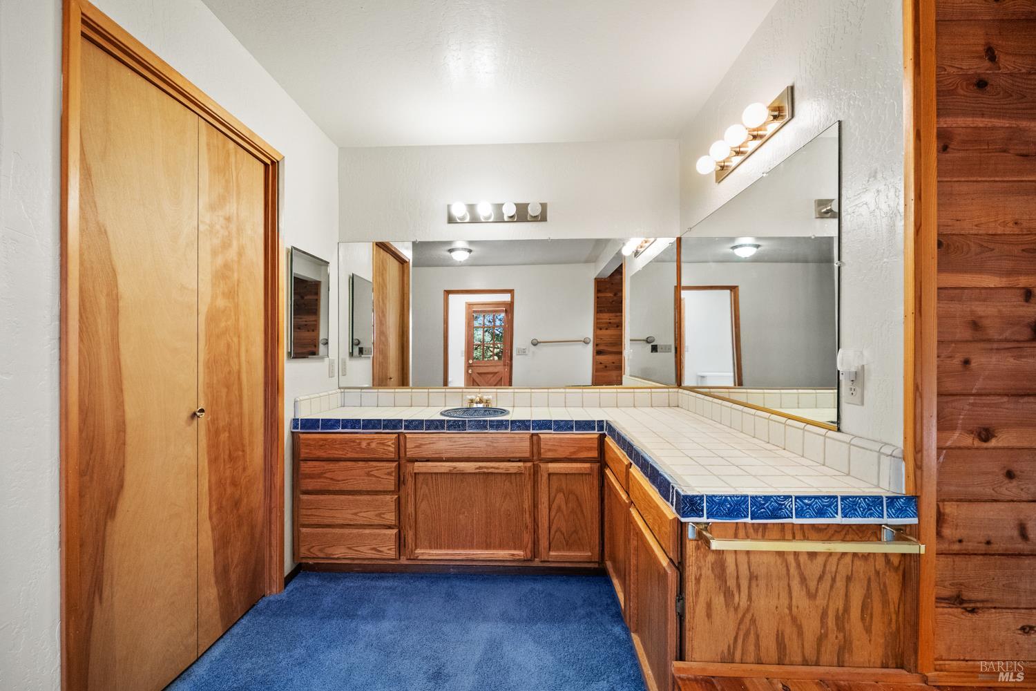 46320 Iversen Road Gualala, CA 95445 - Photo 19 of 46 a large kitchen with a sink and dishwasher a stove with wooden floor