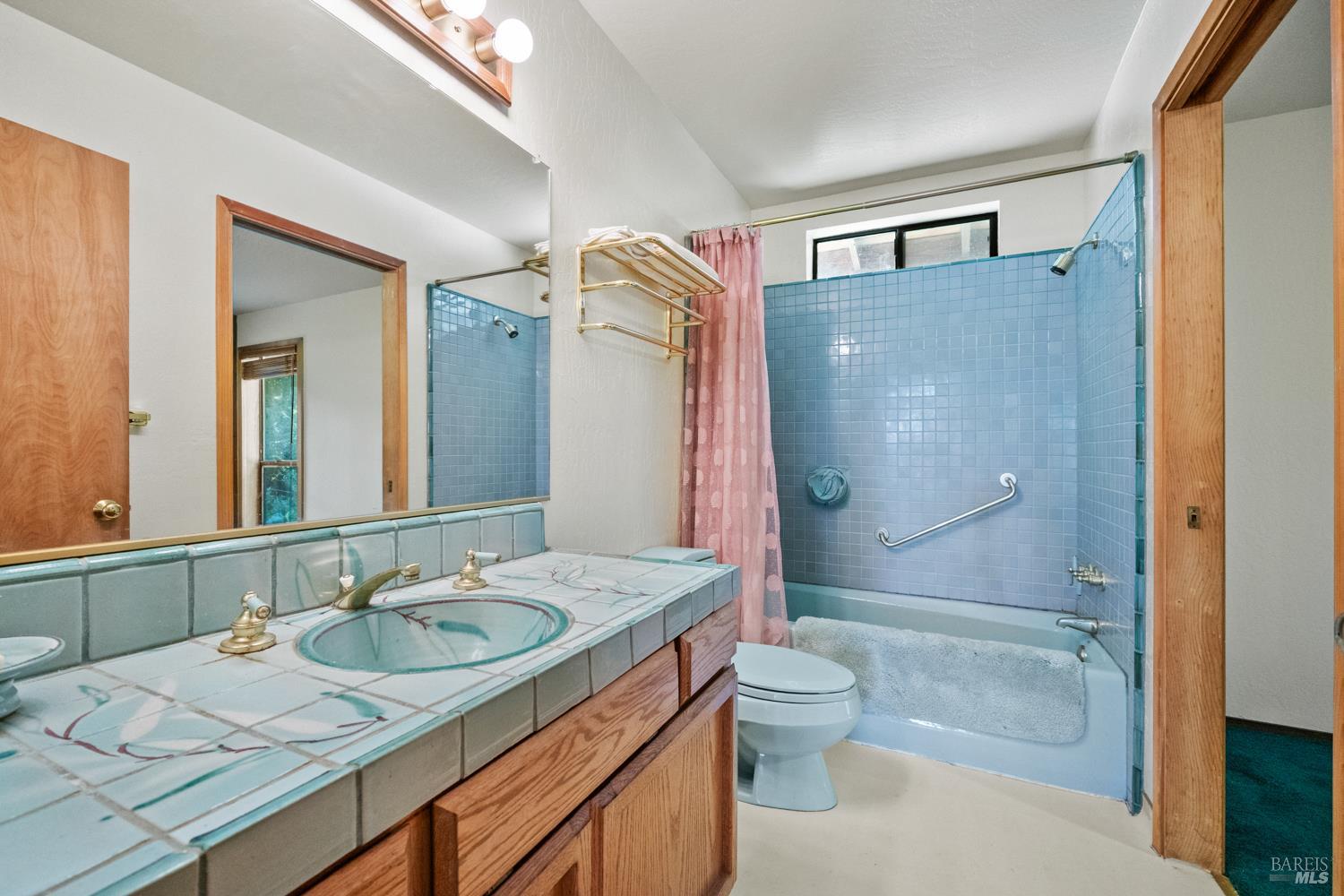 46320 Iversen Road Gualala, CA 95445 - Photo 25 of 46 a bathroom with a granite countertop sink toilet and shower