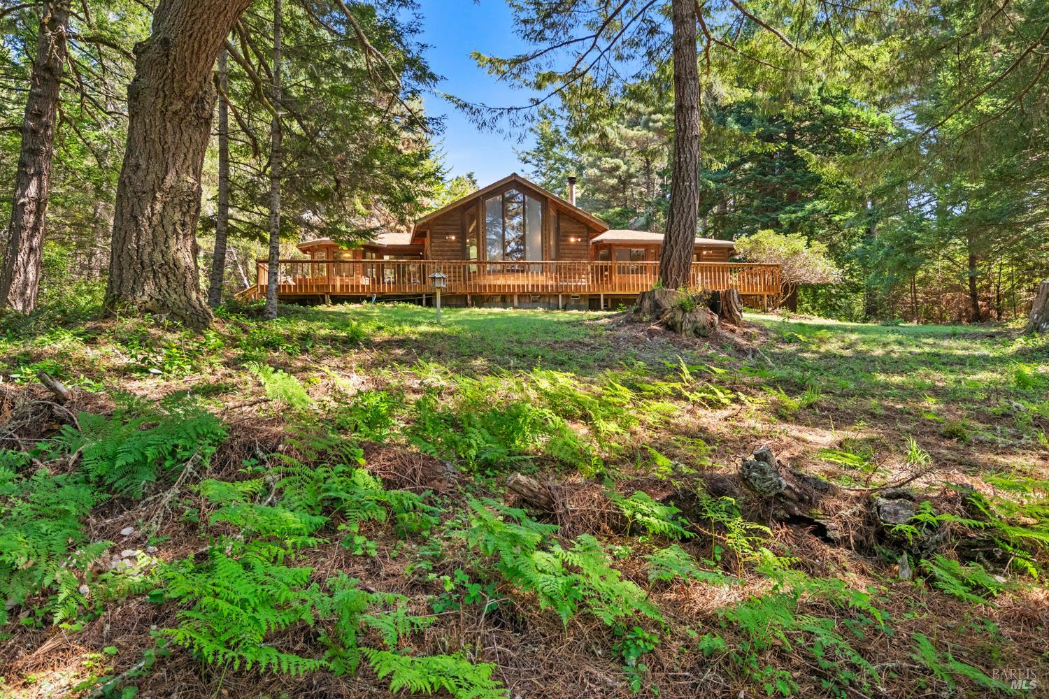 46320 Iversen Road Gualala, CA 95445 - Photo 41 of 46 a house view with a garden space