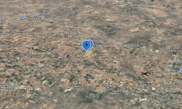 a view of a dry yard in a backyard