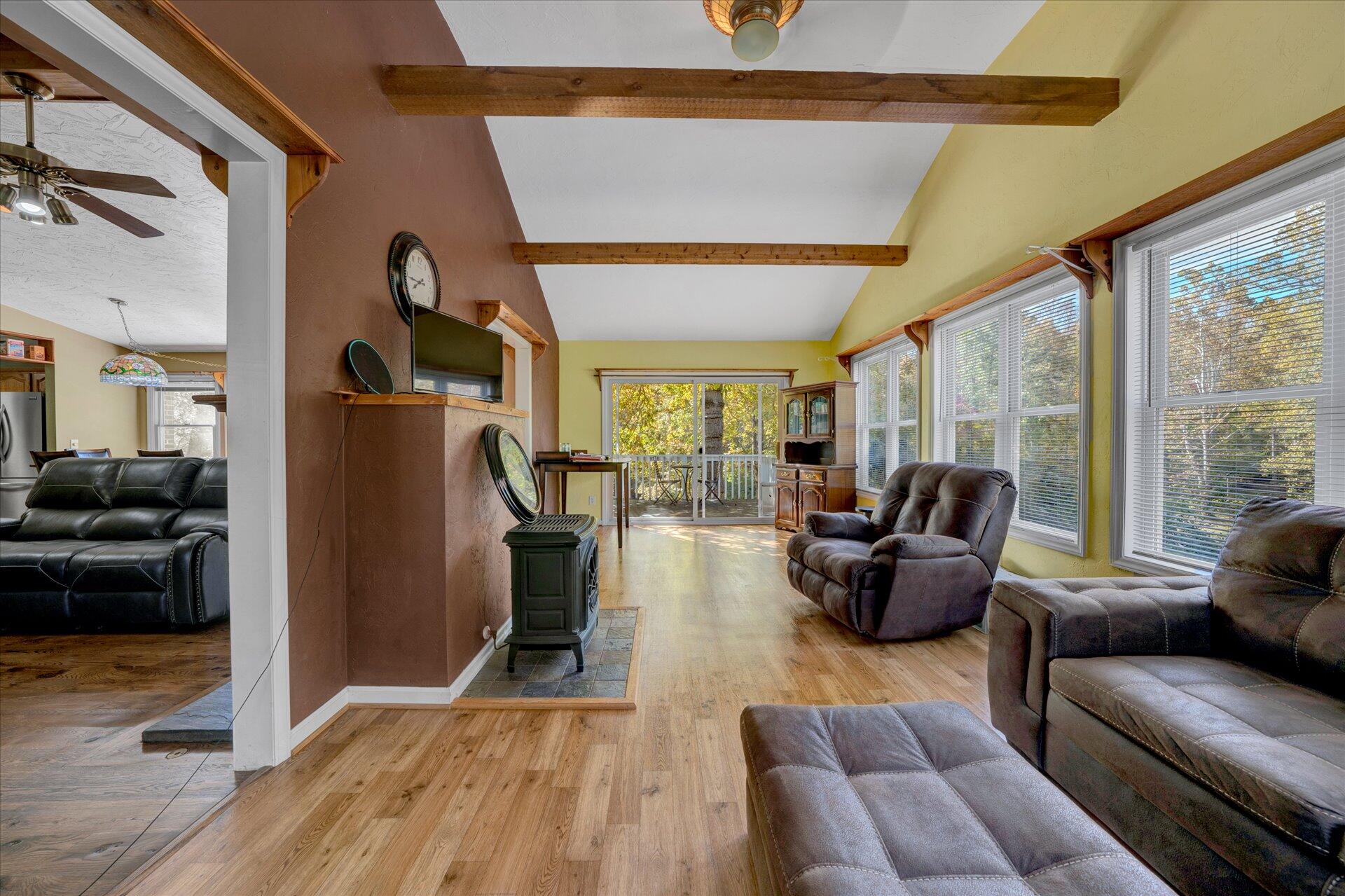 1041 Owen Ridge Lane Goodview, VA 24095 - Photo 20 of 58 a living room with furniture and a large window