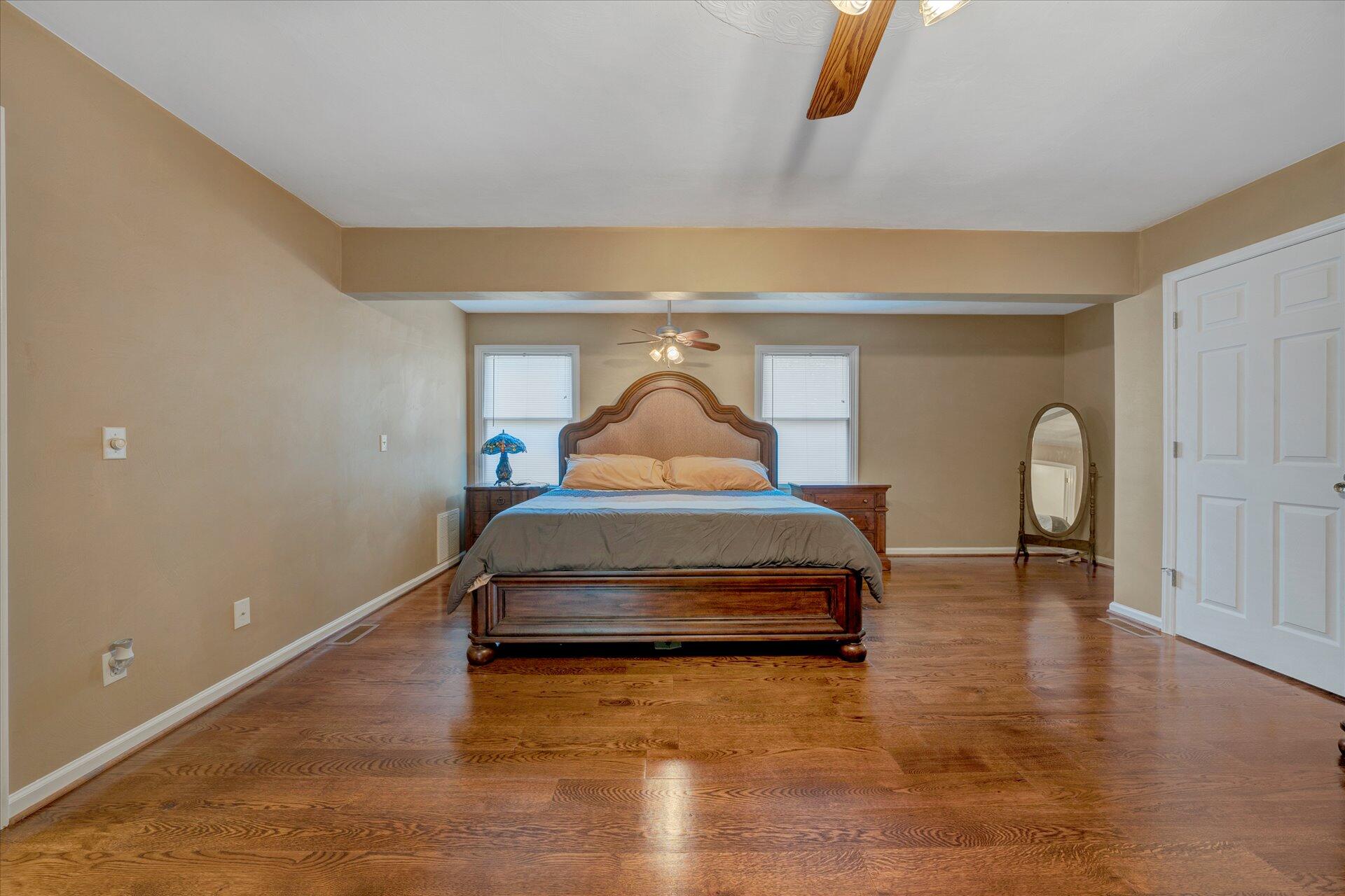 1041 Owen Ridge Lane Goodview, VA 24095 - Photo 23 of 58 a bedroom with a bed and window