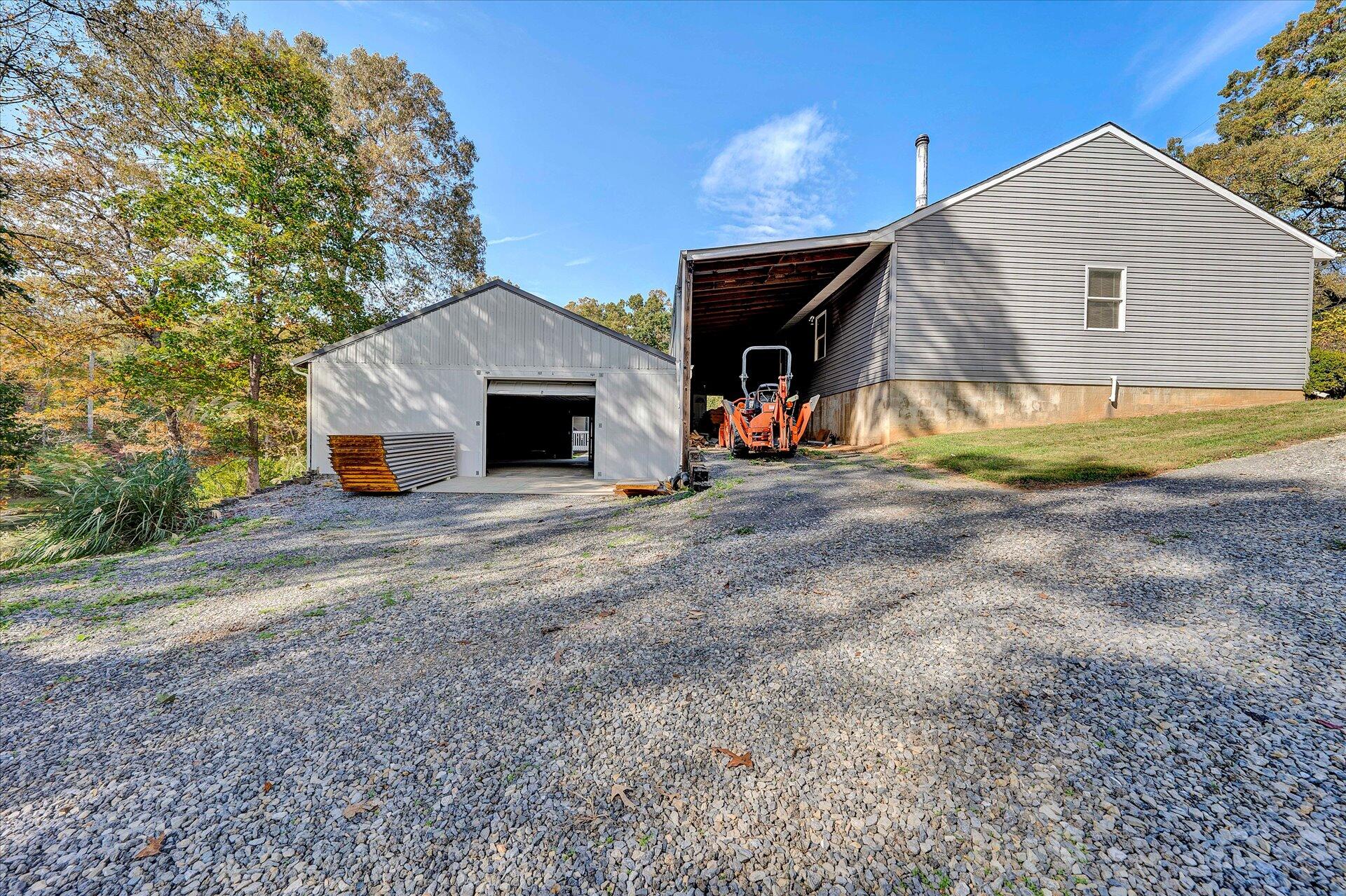 1041 Owen Ridge Lane Goodview, VA 24095 - Photo 41 of 58 a view of a house with backyard and trees
