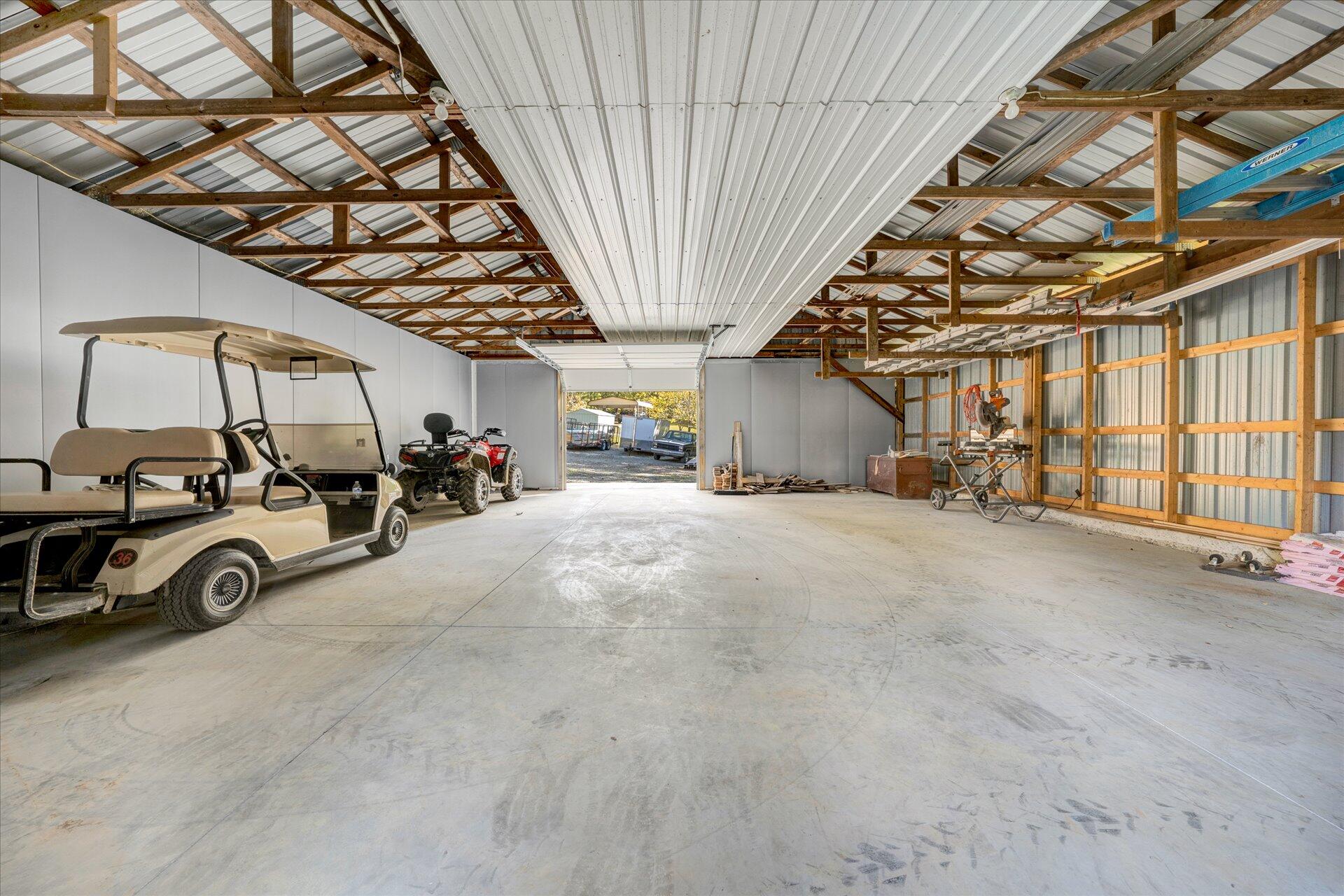 1041 Owen Ridge Lane Goodview, VA 24095 - Photo 44 of 58 a view of parking garage with cars