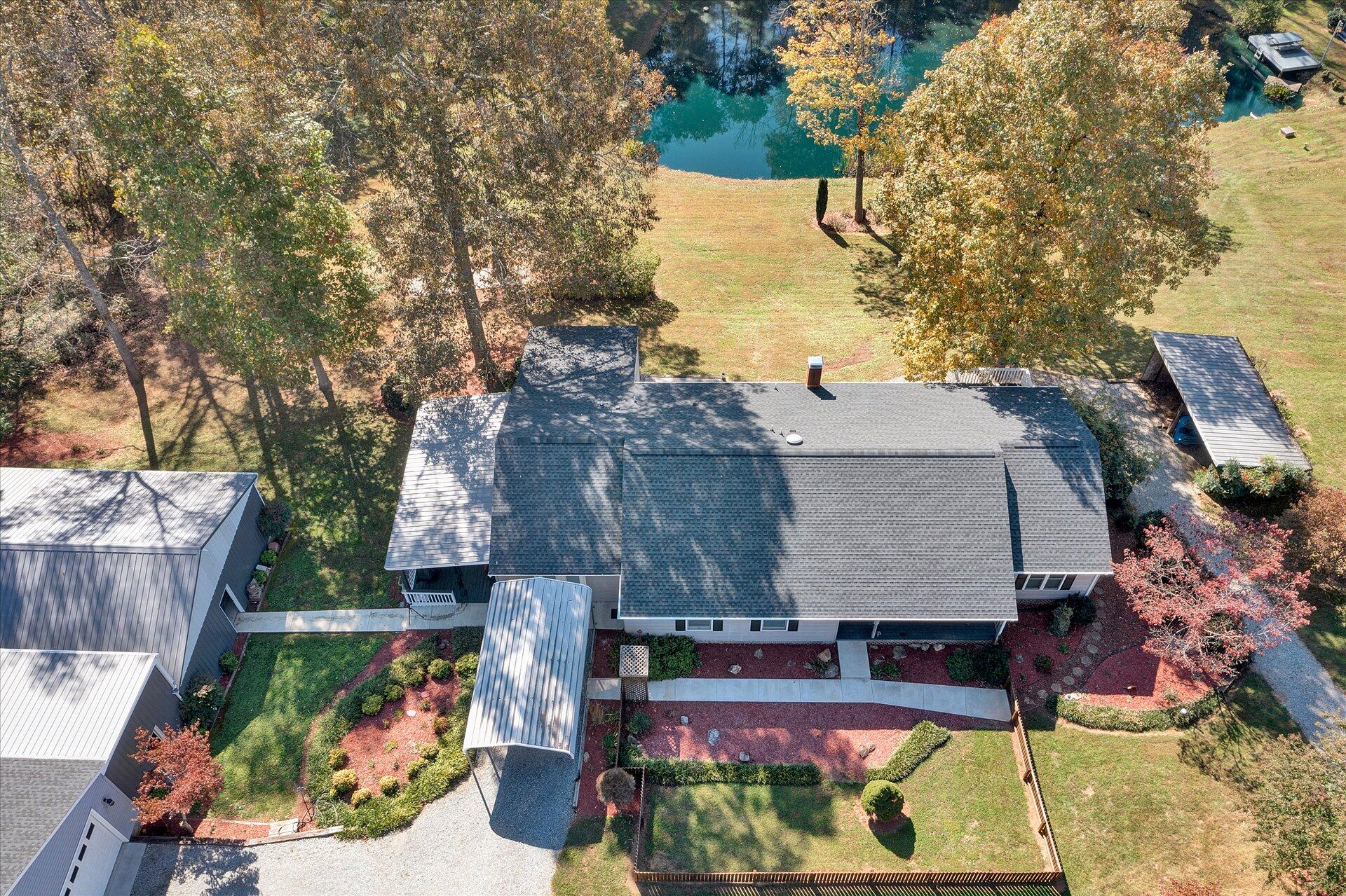 1041 Owen Ridge Lane Goodview, VA 24095 - Photo 50 of 58 a view of swimming pool with sitting area and furniture