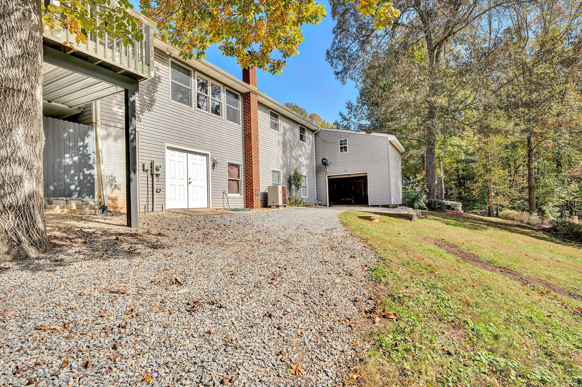 1041 Owen Ridge Lane Goodview, VA 24095 - Photo 56 of 58 a view of a house with a yard