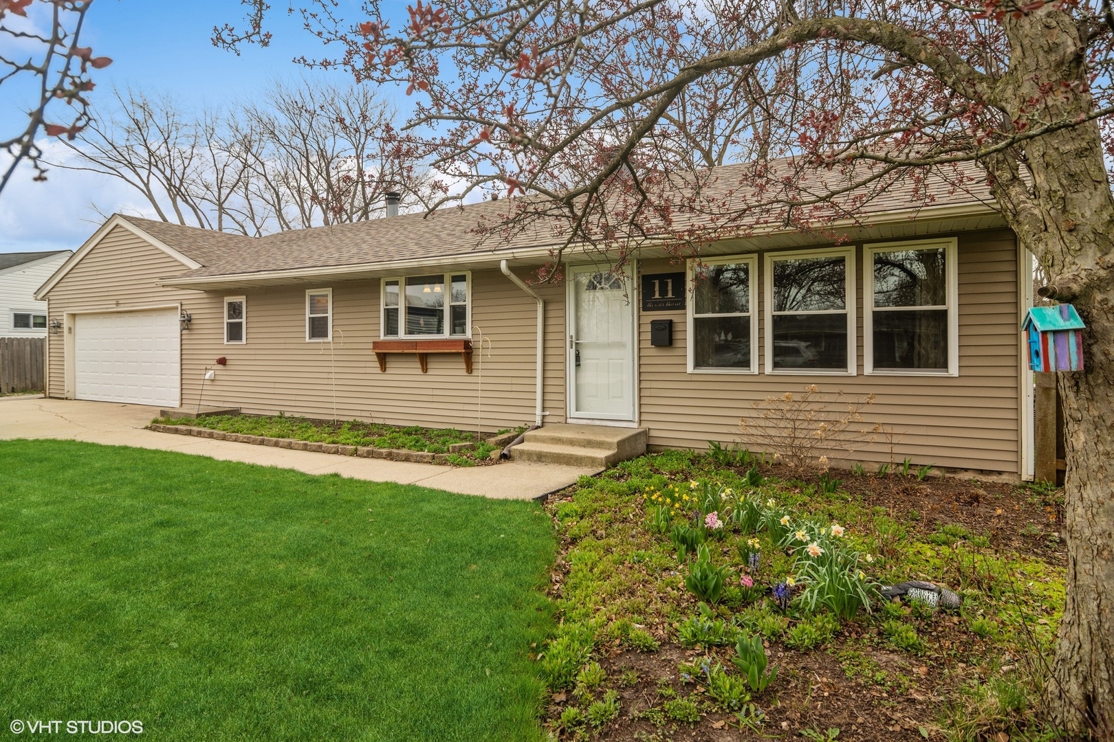 front view of a house with a yard