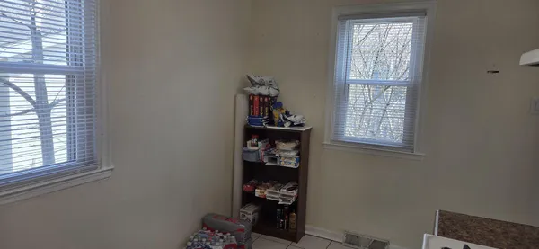 an room with toys and a window