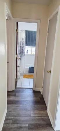 a view of entryway with wooden floor