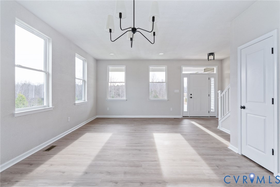 63 Hatcher Road Powhatan, VA 23139 - Photo 11 of 48 a view of an empty room with a window