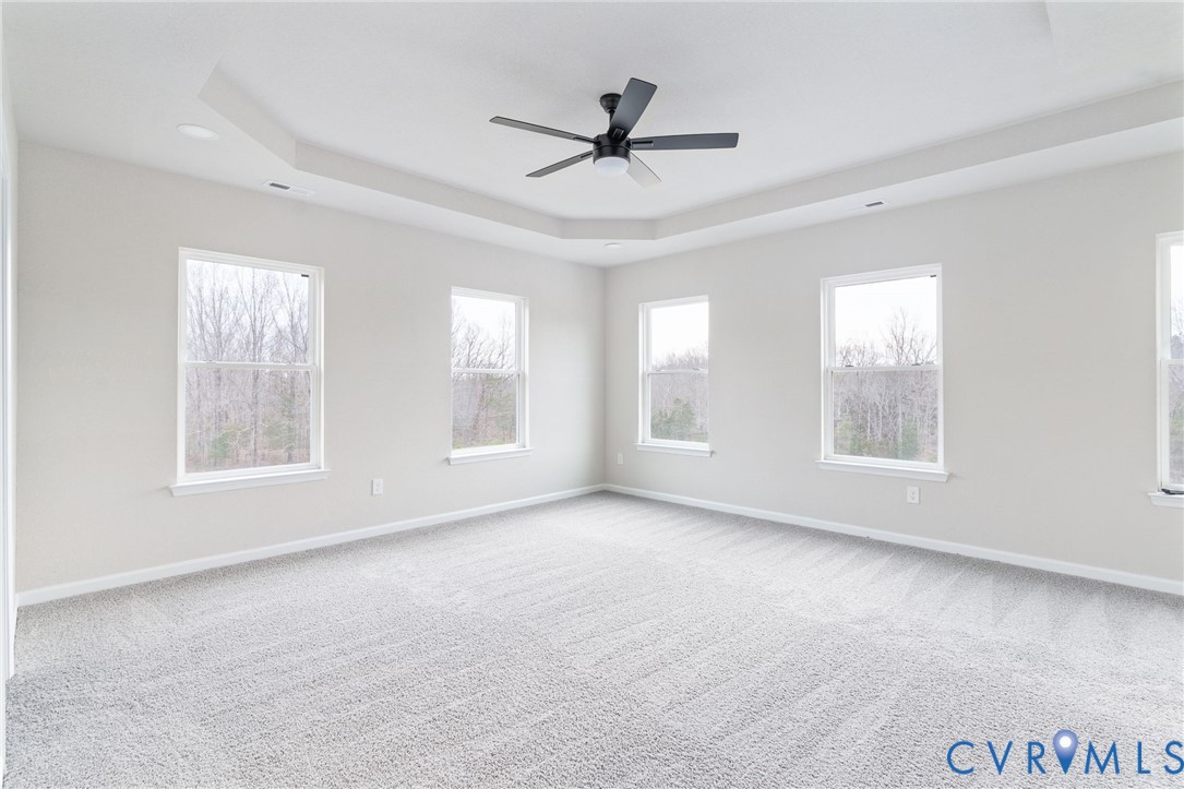 63 Hatcher Road Powhatan, VA 23139 - Photo 28 of 48 a view of a livingroom with a ceiling fan and window