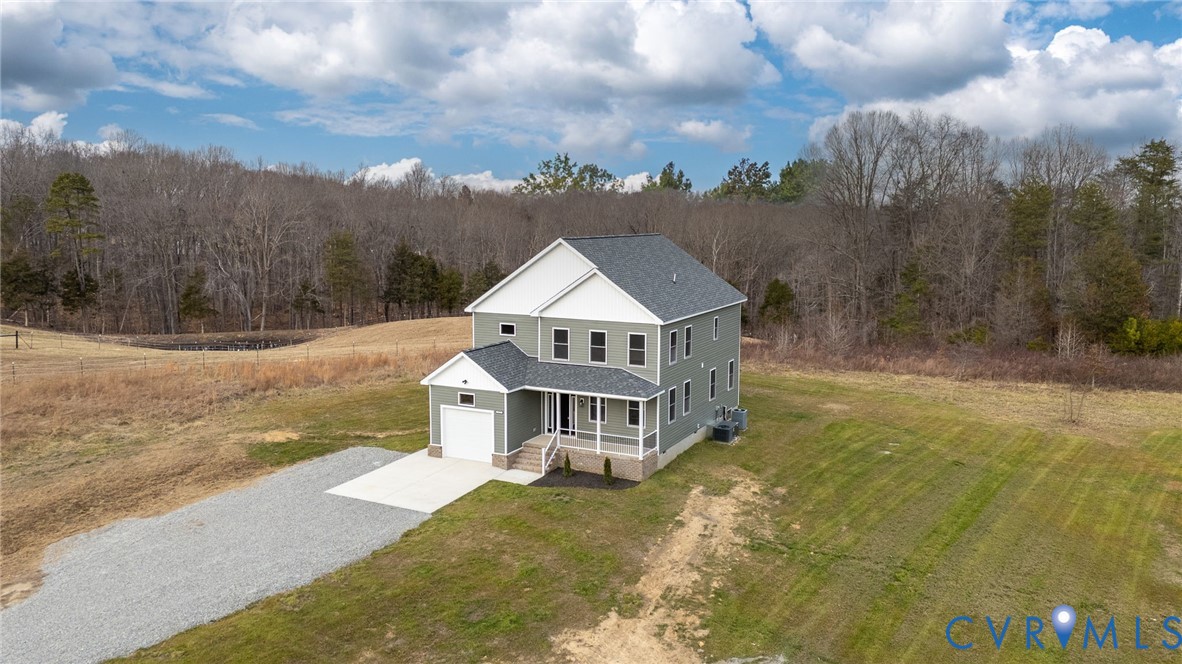 63 Hatcher Road Powhatan, VA 23139 - Photo 3 of 48 a view of a house with a big yard