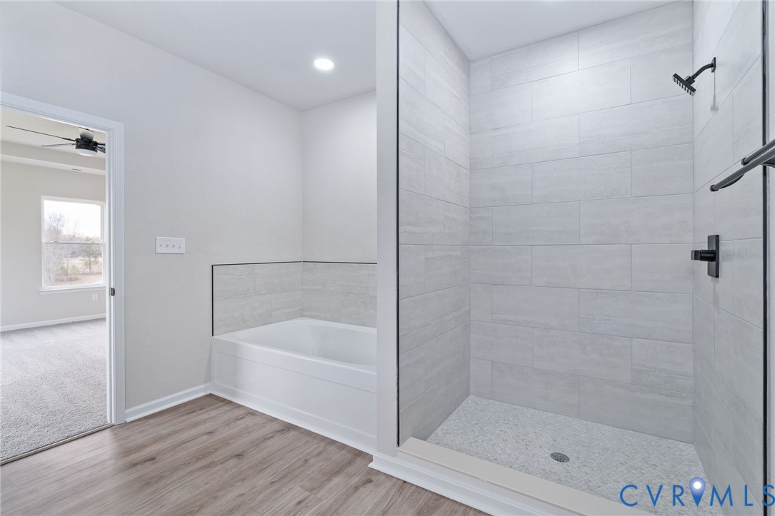 63 Hatcher Road Powhatan, VA 23139 - Photo 32 of 48 a bathroom with a bathtub