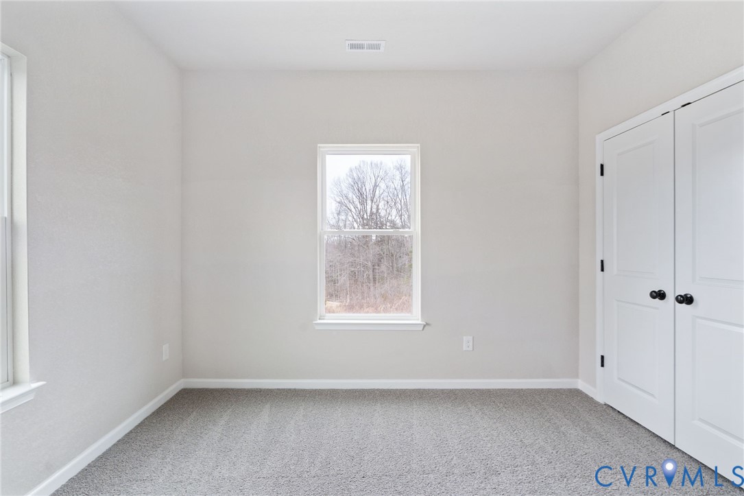 63 Hatcher Road Powhatan, VA 23139 - Photo 35 of 48 a view of an empty room with a window