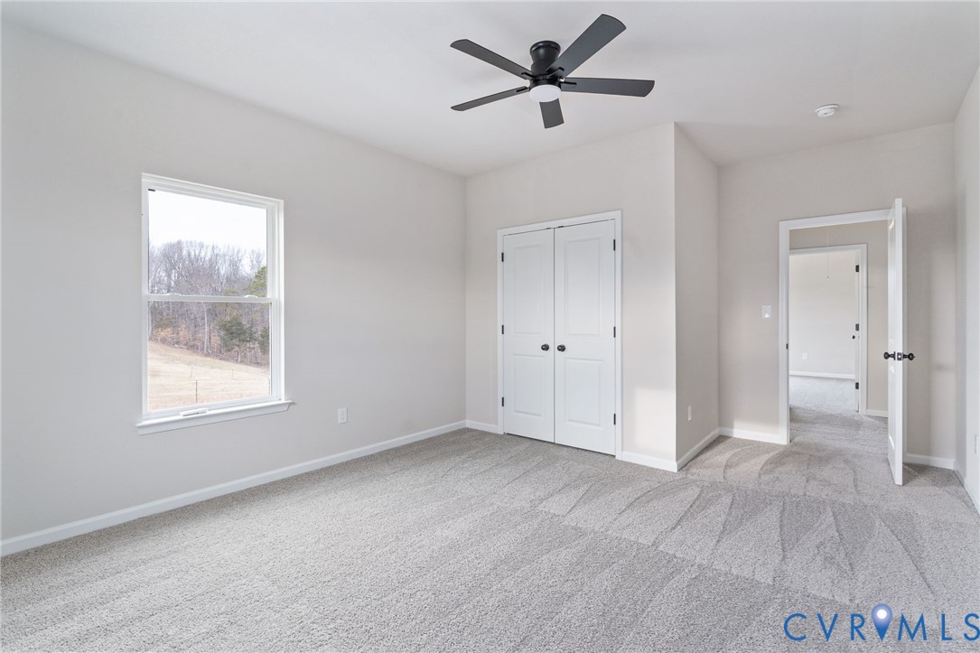 63 Hatcher Road Powhatan, VA 23139 - Photo 40 of 48 a view of empty room with wooden floor and window