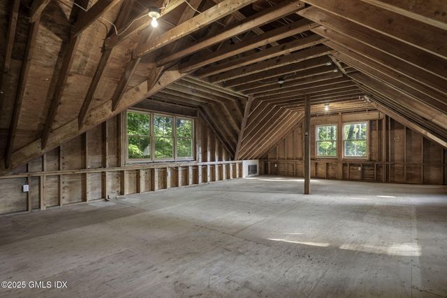 a picture of a wall with a white wall and a painting