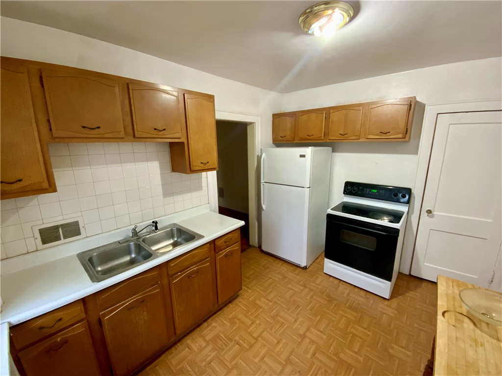 518 Augustine Street Rochester, NY 14613 - Photo 2 of 20 upstairs unit kitchen